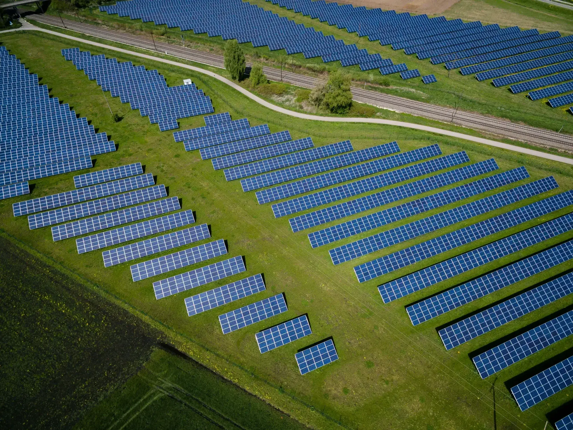 Rows of solar panels at a solar farm
