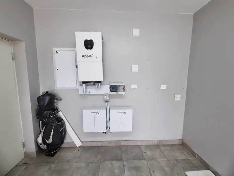 Apple Mars inverter and two batteries on the garage wall